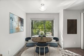Silverdale apartment for rent - A dining room with a round table and chairs.
