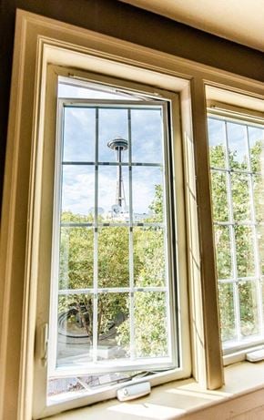 Seattle apartment for rent - A window with a view of a balcony and trees. at Edwards on Fifth, Seattle, 98121