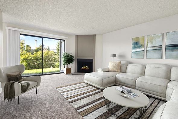 Tacoma apartment for rent - a living room with white furniture and a fireplace at The Verandas, Tacoma, Washington