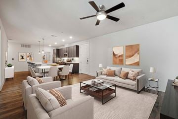 Scottsdale apartment for rent - A modern living room with a grey sofa set and a wooden coffee table.