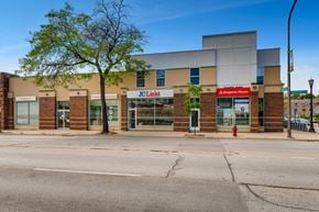 Evanston apartment for rent - the front of a mall with a red fire hydrant on the street