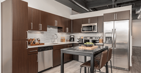 Glendale apartment for rent - a kitchen with stainless steel appliances and a marble counter top