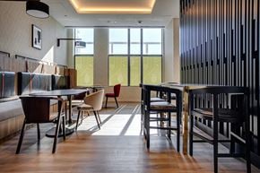 Edmonton apartment for rent - a room filled with furniture and a large window  at Citizen on Jasper, Edmonton, AB