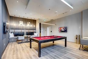 Edmonton apartment for rent - the club room at the collective venues canary wharf business (0)  at Citizen on Jasper, Edmonton, Alberta