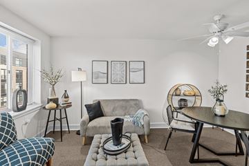 Alexandria apartment for rent - a living room and dining room with a couch and a table