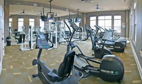 Midlothian apartment for rent - A gym with a variety of exercise equipment including treadmills and stationary bikes.
