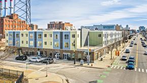Detroit apartment for rent - a row of buildings on a city street