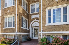 Detroit apartment for rent - the front of a brick building with a door and windows