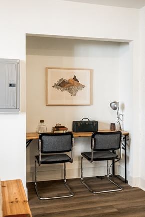 Detroit apartment for rent - A room with a desk and two chairs.