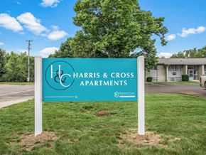 Ypsilanti apartment for rent - a sign in front of a building that says harris & cross apartments