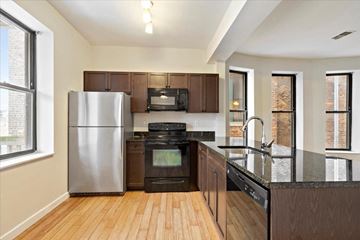 Detroit apartment for rent - a kitchen with stainless steel appliances and a counter top