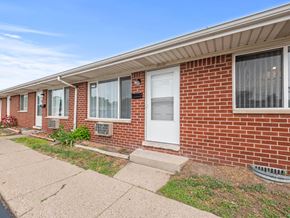 Ypsilanti apartment for rent - a brick building with a white door and windows
