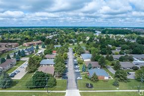 Sterling Heights apartment for rent - an aerial view of a neighborhood with houses and trees