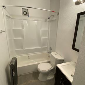 Detroit apartment for rent - a bathroom with a toilet and a tub and a sink