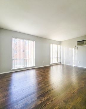 Ferndale apartment for rent - an empty living room with wood floors and a large window