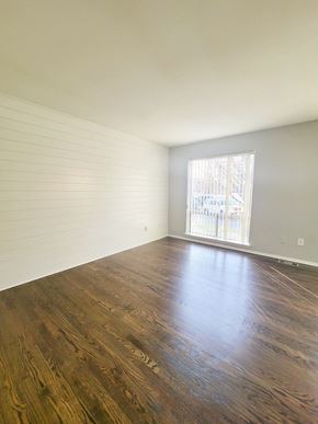 Ferndale apartment for rent - an empty living room with wood floors and a window