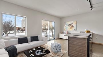 Detroit apartment for rent - a living room with a couch and a coffee table