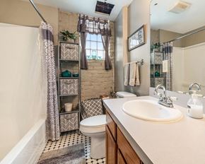 Detroit apartment for rent - a bathroom with a toilet sink and shower