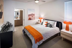 Las Vegas apartment for rent - Bedrooms include ceiling fans and carpeted floors