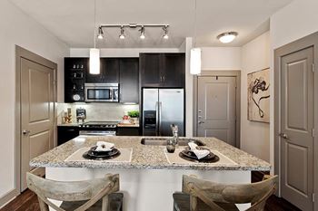 Granite and quartz countertops in kitchen