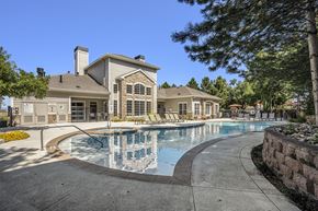 Denver apartment for rent - The Ridge at Lowry outdoor pool with relaxing seating