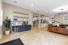 Everett apartment for rent - A well-lit, spacious interior with wooden flooring and a variety of furniture and decor.