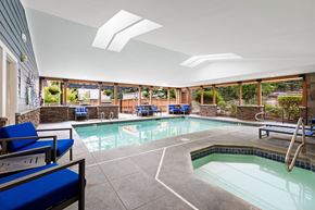 Everett apartment for rent - A large indoor swimming pool with a slide.