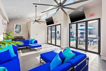 Indoor cabana area with tvs