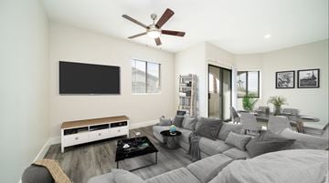 Phoenix apartment for rent - a living room with a couch and a ceiling fan