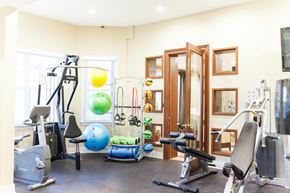 Newport News apartment for rent - a gym with weights and other exercise equipment in a home