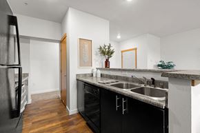 Yelm apartment for rent - Stylish Kitchen with stainless stell sink at Tustin Apartment Homes, Yelm, WA, 98597