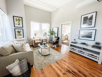 Albany apartment for rent - a living room with a couch and a coffee table