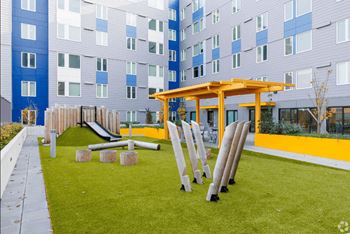 A childrens play area at the grove apartments