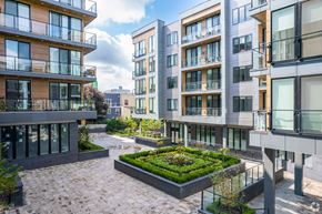 Philadelphia apartment for rent - A modern residential area with apartment buildings and a central courtyard.