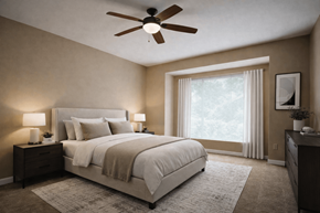 Houston apartment for rent - A bedroom with a bed, nightstands, and a ceiling fan.