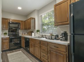 Longwood apartment for rent - Longwood Sabal Park Apartments kitchen with solid-oak cabinetry