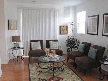 Toms River apartment for rent - a living room with chairs and a table