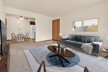Davenport apartment for rent - A living room with a grey couch and a coffee table.