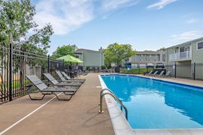 Davenport apartment for rent - Pool With Lounge Chairs at Windsor Crest Apartments, Davenport