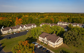 Bristol apartment for rent - A large building surrounded by trees in the fall.