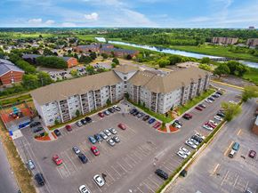 Kingston apartment for rent - an aerial view of an apartment building and parking lot