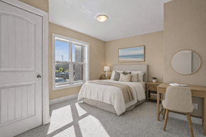 Kingston apartment for rent - A bedroom with a bed, desk, and chair.