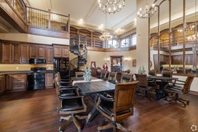 Kingston apartment for rent - A large dining room with a wooden table and chairs.