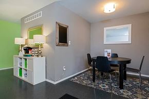 Clinton Township apartment for rent - a dining room with a table and chairs and a window