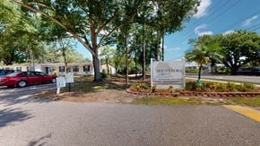 Mt. Dora apartment for rent - a mobile home park with a red car parked in front of it