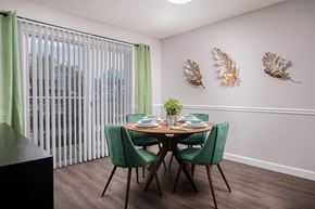 Tampa apartment for rent - our apartments offer a dining room with a table and chairs  at The Park at Chesterfield Apartment Homes, Tampa, Florida