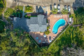 Lakeland apartment for rent - A large house with a pool in the backyard.
