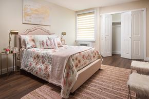 Warminster apartment for rent - a bedroom with a bed and a window and a rug at Aspen Grove Apartment Homes, Warminster Pennsylvania