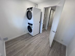 Vancouver apartment for rent - a washer and dryer in a small room