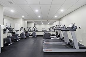 Belleville apartment for rent - A gym with treadmills and elliptical machines.